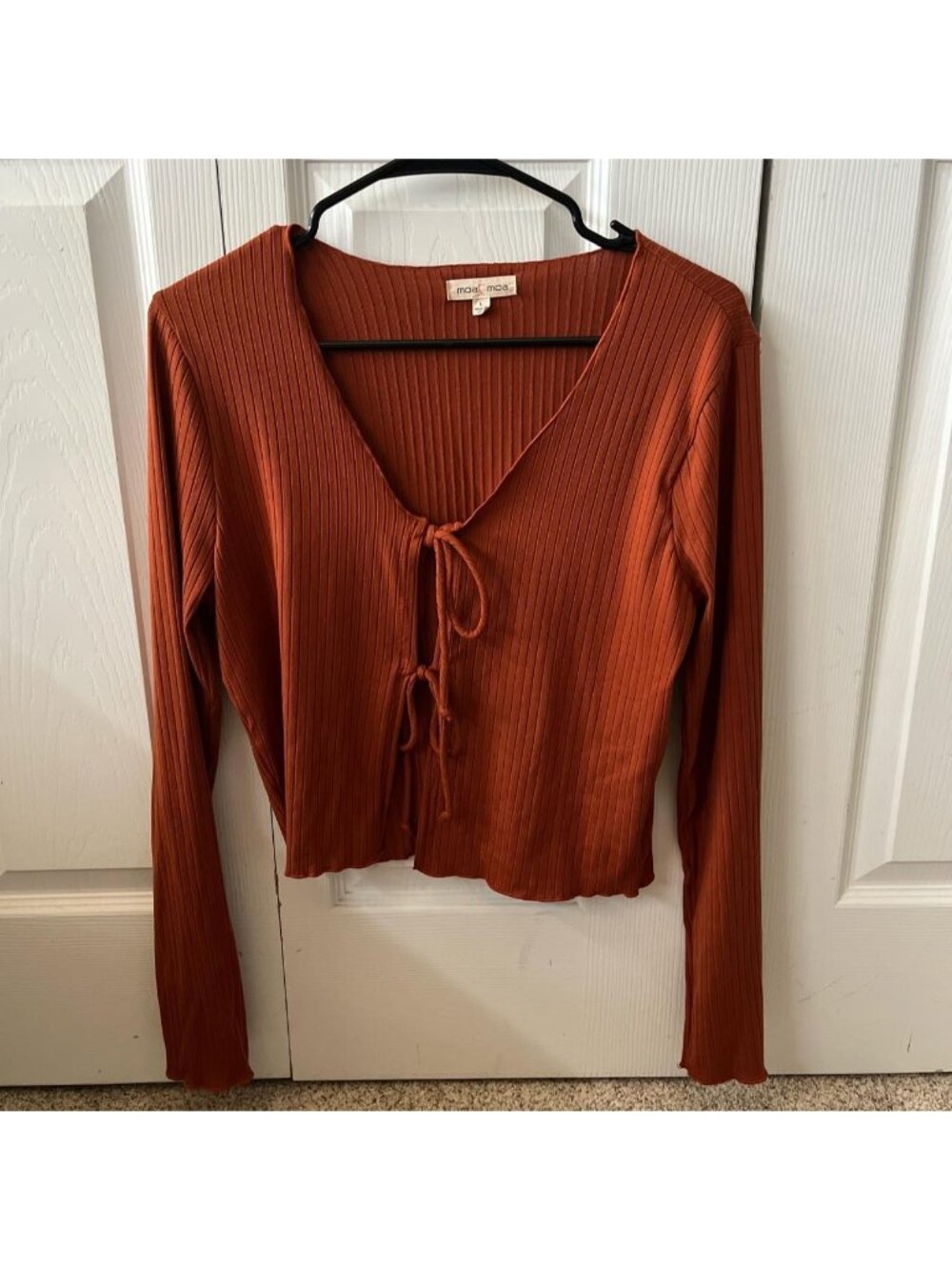 Burnt orange/terracotta colored long sleeve ribbed top